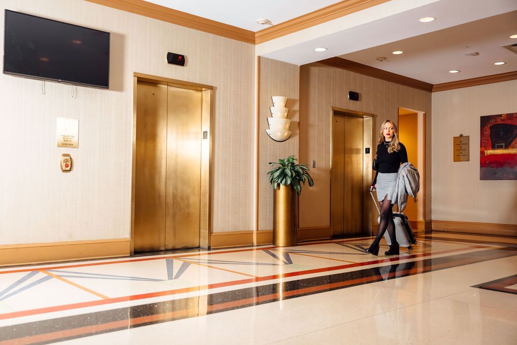 Woman walking through hotel